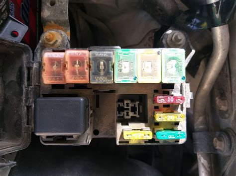 ford escort 98 fuse under hood  If you have power to the BLACK/ORANGE wires at the CCRM , (Straight from 40 amp fuse) Then warm the engine up and monitor the ground to the PINK/WHITE wire at the CCRM, You should get a ground signal on that wire at